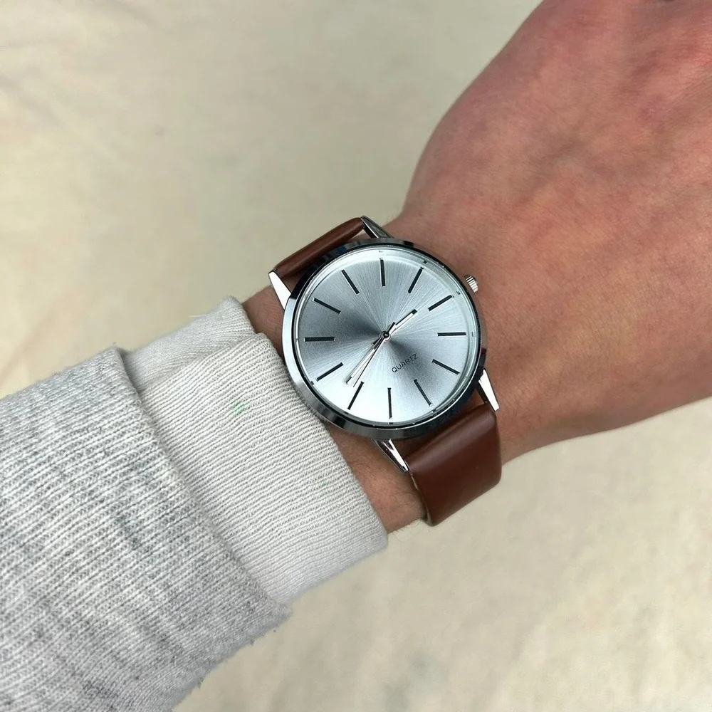 Minimalistic essential vintage style watch stainless steel brown and silver